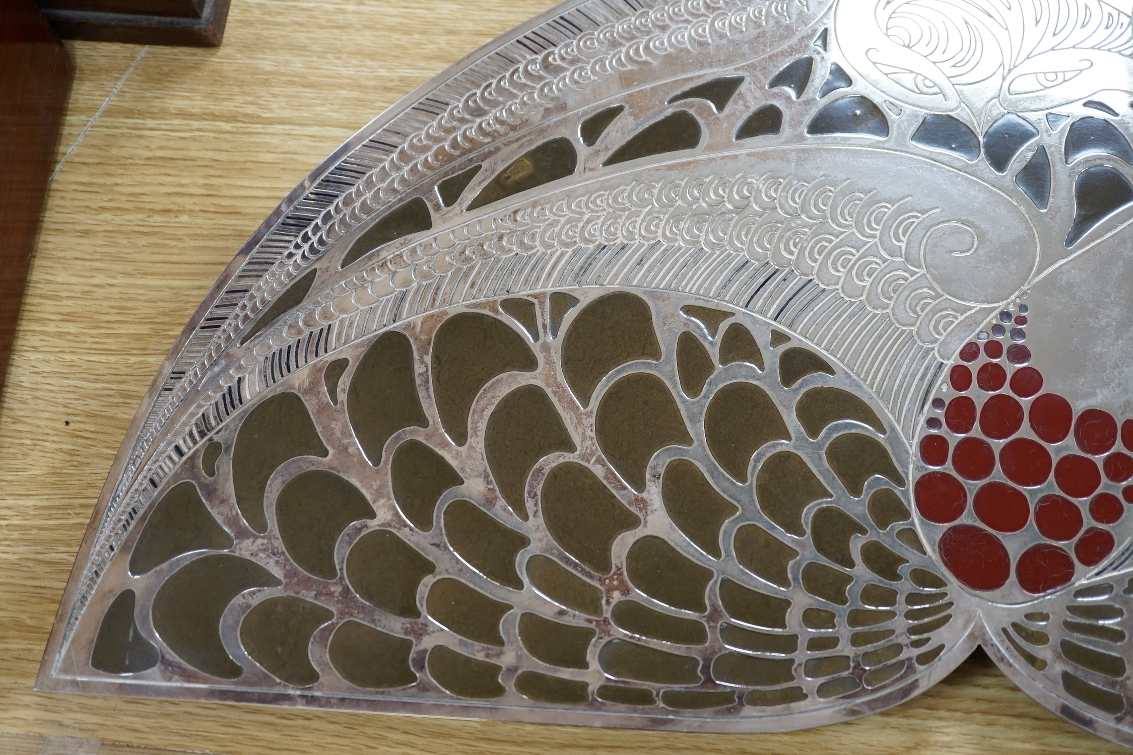 After Erte. A decorative panel or stand, with stylised decoration, 62cm wide